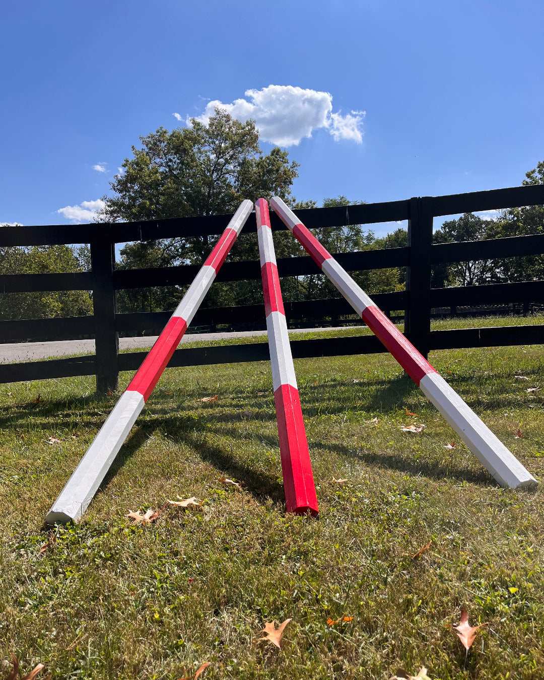 Red and White Wooden Jump Poles